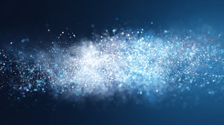Blue and white glitter particles on dark background, sparkling festive dust wave, abstract luxury textureの素材