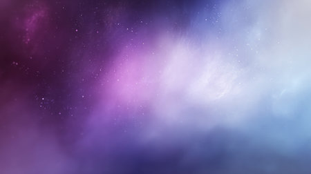Violet and blue cosmic nebula with glowing particles and dreamy light backgroundの素材