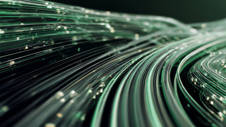 Flowing green fiber optic lines with glowing light points, abstract digital data stream backgroundの素材