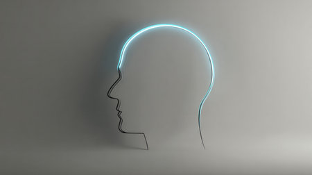 Minimal human head outline with glowing blue neon line on gray backgroundの素材