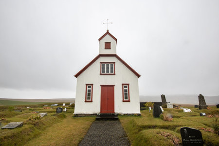 Church with red door in Iceland