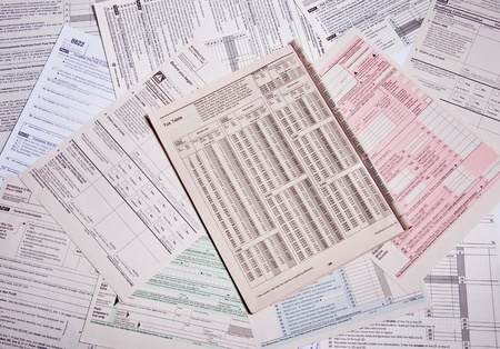 Multi colored and topics tax forms spreadの写真素材