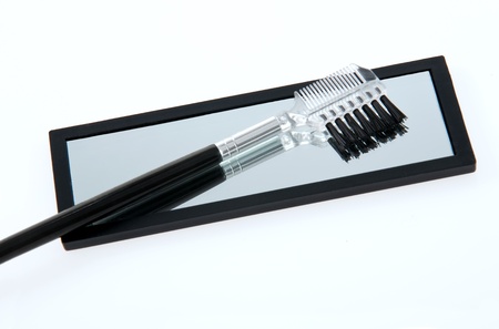 Mirror and brush set for touch-upsの写真素材