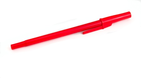 Red ink pen for notes on lossesの写真素材