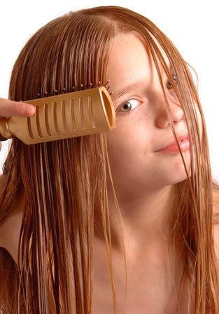 Girl with Wet Clean Hair Combing