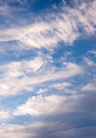 Cloudscape with puffy and whispy cloud patternsの写真素材