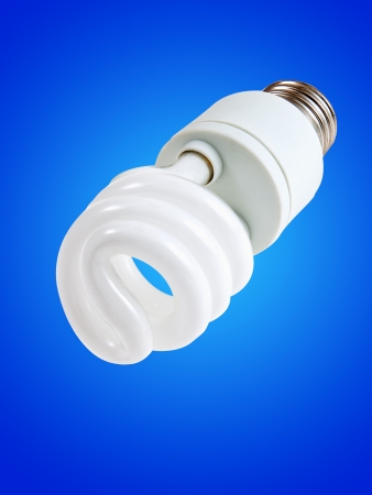 New style light bulb glowing on blueの写真素材