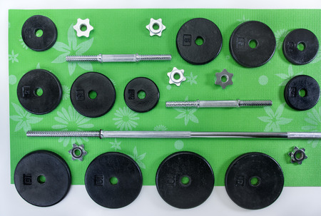 Iron and steel free weights set for fitnessの写真素材