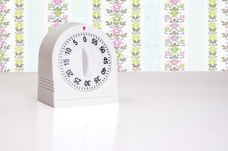 Minute timer on kitchen counter topの写真素材