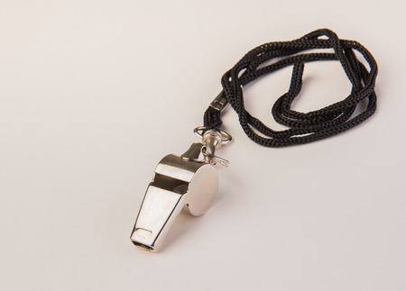 Coaches chrome sports whistle on a ropeの写真素材