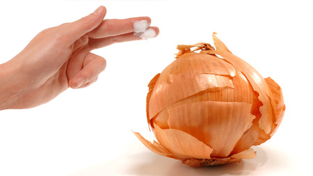 Dry skin on onion representing skincare problemsの写真素材