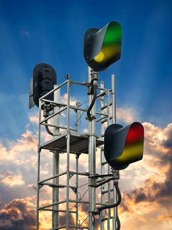 Flashing lights of track and road signalsの写真素材