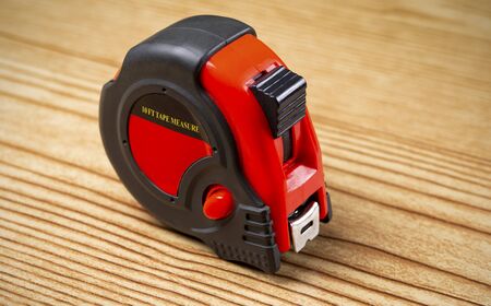 Small handy tape measure for fixer upper homeの写真素材