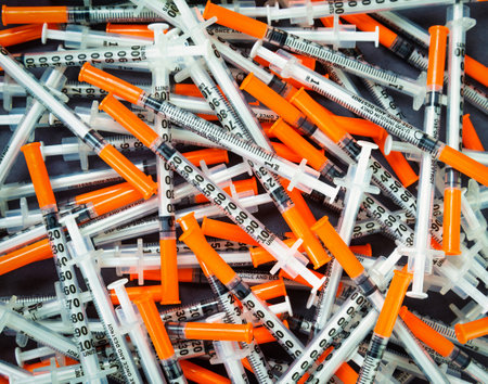 Orange Insuline Syringes for diabetic controlの写真素材