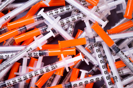 Orange Insuline Syringes for diabetic controlの写真素材
