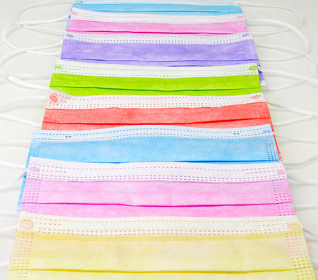 Highkey tabletop of Colorful face masks virus safetyの写真素材