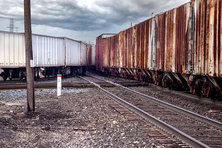 Two freight trains entering Detroit area railyard for distibution to local cutomersの写真素材