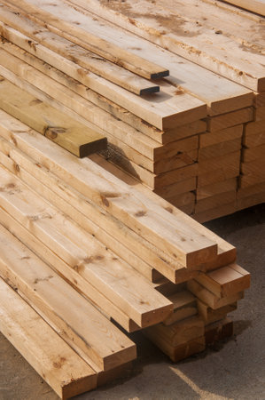 Pre-fab and cut lumber pile for easy set-upの写真素材