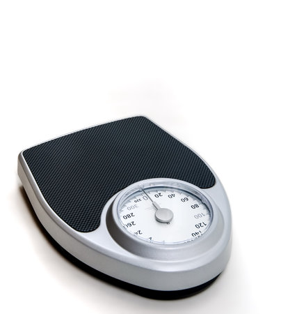 Classic analog bathroom scale for weight management and personal health monitoring.の写真素材