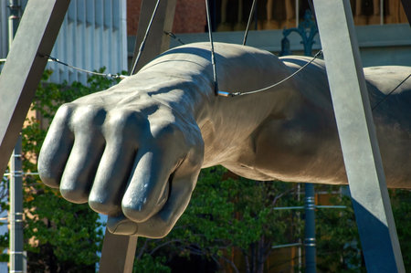 Large sculpture of a fist is suspended from the ceiling. downtown Detroitの写真素材
