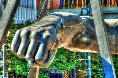 Large sculpture of a fist is suspended from the ceiling. downtown Detroit Hdr effectの写真素材