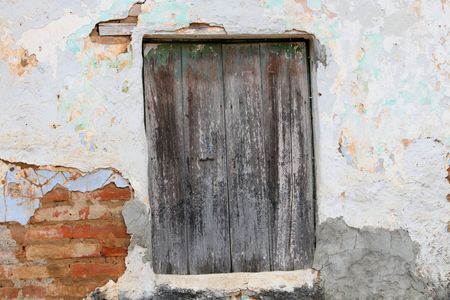 peeling paint on a wooden doorの写真素材