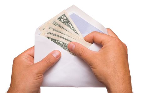 human hands is counting a cash in an envelope on whiteの写真素材