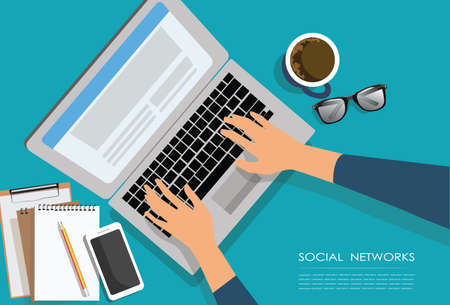 Female hands typing text on the laptop keyboard and using social networks for communication. Top view of people working with computer at the work desk.tecnology conceptのイラスト素材