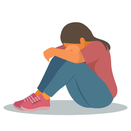 sad woman hug her knee and cry. vector, illustrationのイラスト素材