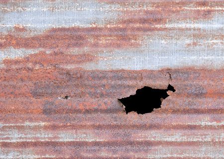 Old  rusty zinc fence weathered perforated  background and Texture 