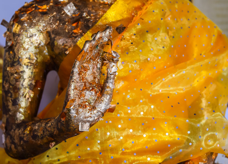 Old Hand of Buddha statue gildの写真素材