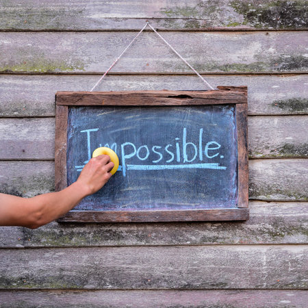 erases the impossible on blackboard to  i possibleの写真素材
