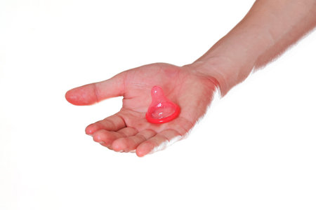 Condom in handの写真素材