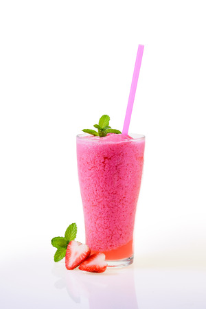 Top view,strawberry smoothies, allow to cool,Perfect to quench thirst in this hot weathe (shallow DOF ) on whiteの写真素材