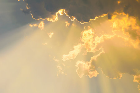 Beautiful Blurred Sunset Sky and Beams of sunligh Background