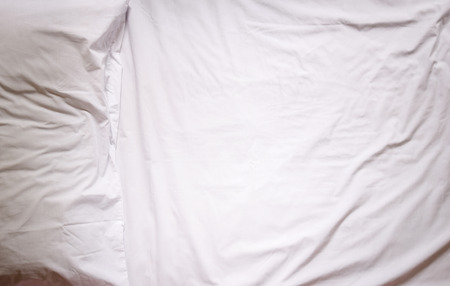 Top view of f bedding sheets and pillowの写真素材