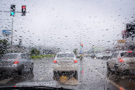 Rain drop on car grass with motion blur effect ,concept for drive on rainの写真素材