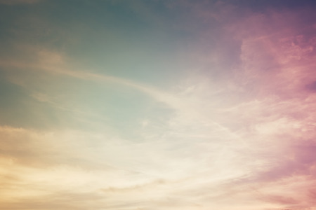 Fantastic soft white clouds against blue sky for background designの写真素材