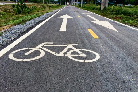 Bike lanes in the park with  Bike lane sign on asphalt,の写真素材
