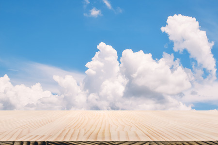 wood floor table under blue sky for backgroundの写真素材