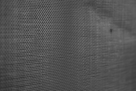 Mosquito wire net screen texture on the window closeupの写真素材