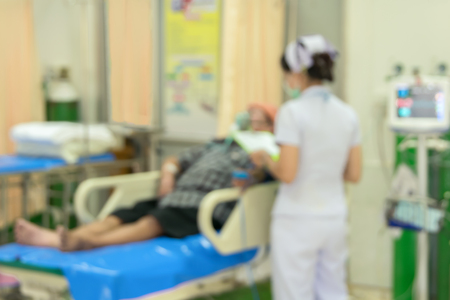 Blurred nurse in emergency room for medicine background conceptの写真素材