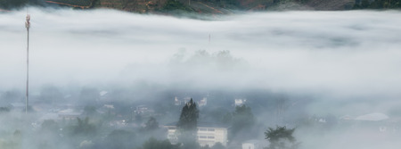 Beautiful autumn landscape countryside in the mistの写真素材
