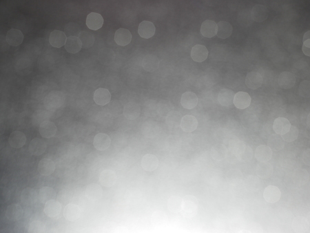 glay background abstract bokeh light for christmas night light holiday ,gradient light abstract background for product or text backdrop for designの写真素材