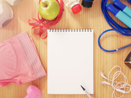 Sports Equipment with copy space on blank notebook for Presentations and Web Design. A Lot of Space for Text Composition art image, website, magazine or graphic for campaign fitness designsの写真素材
