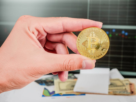 Golden bitcoin with banknote and stock market grap conceptual for crypto currency background.