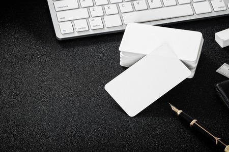 Blank business card mockup on table for design business contact .の写真素材