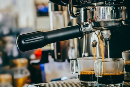 Coffee machine filling a cup ,coffee makerの写真素材