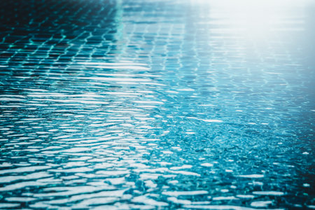 Abstract background of water wave in swimming pool.