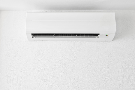 Cool air conditioner on white modern interior room cooling comfortable fresh systemの写真素材